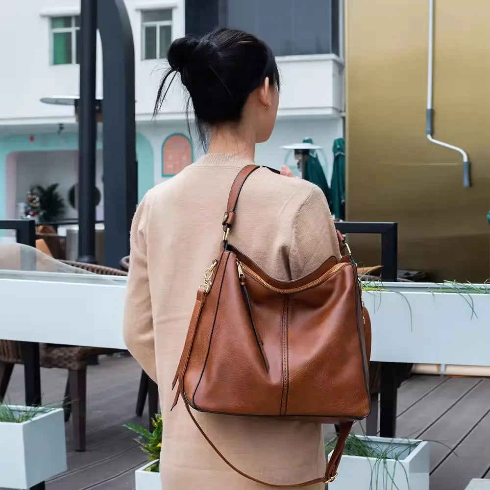 The Everyday Leather Anti-Theft Handbag + FREE Pouch Wallet That Fits Everything